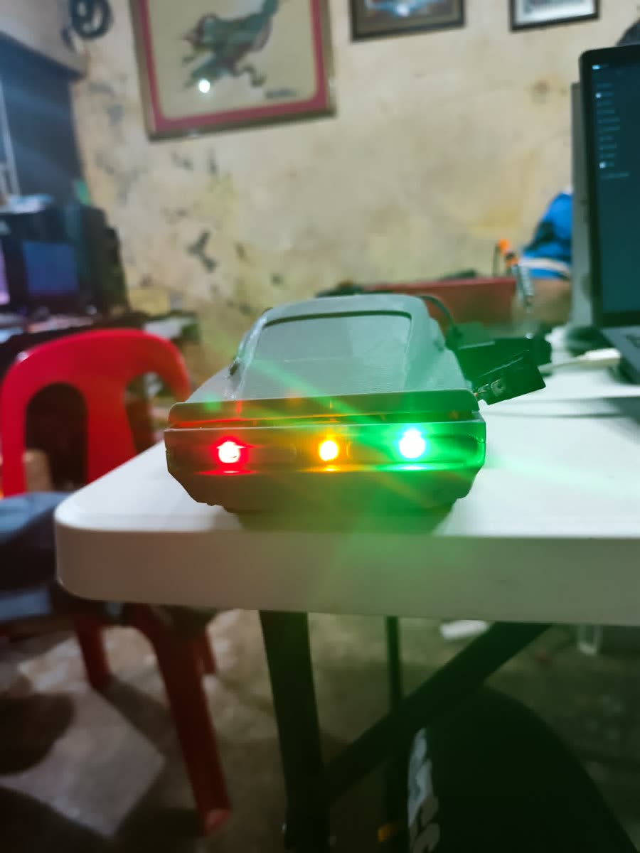 ChaChaBot rear view showing red, yellow, and green charge indicator LEDs lit